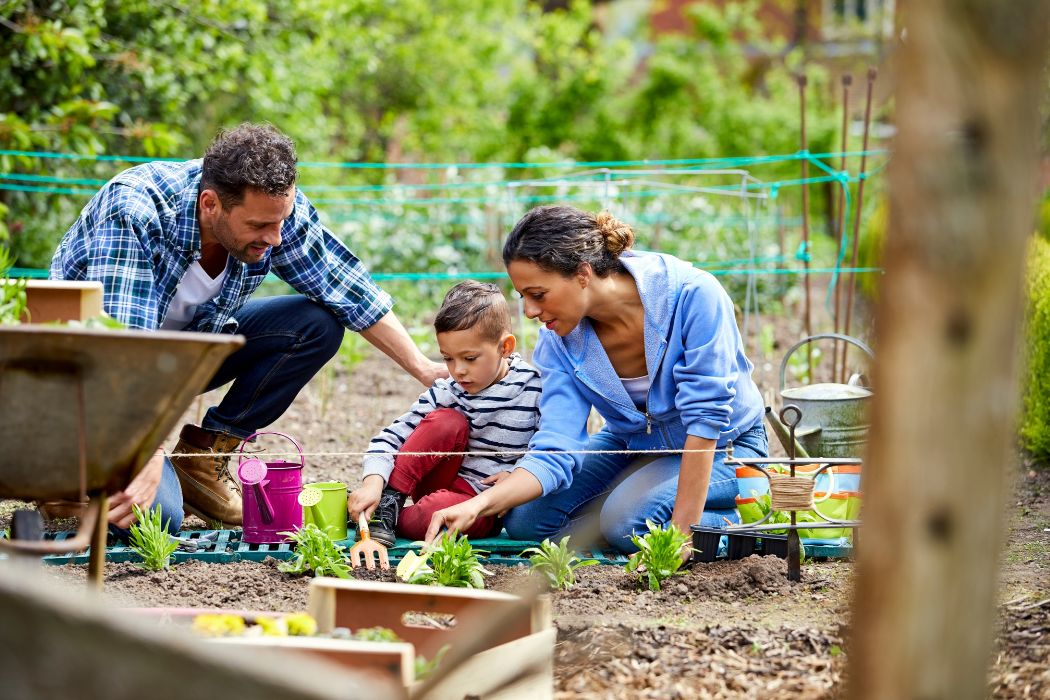 family working in the garden together