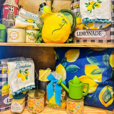 CNF Website Images_400x400 (1) Shelving with yellow-themed decor.
