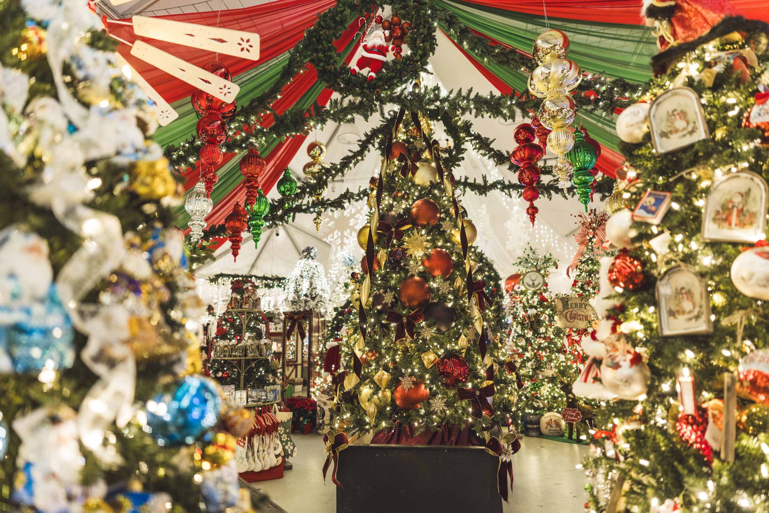 2025cambria-16 (5) christmas tent full of decorated trees ornaments handmade german products and more
