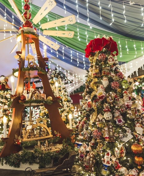 decorated trees with ribbon, garland and other accents in the Seasonal Shopping Experience